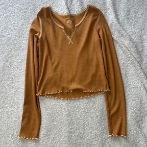 American eagle long sleeve with ruffles. Never worn.